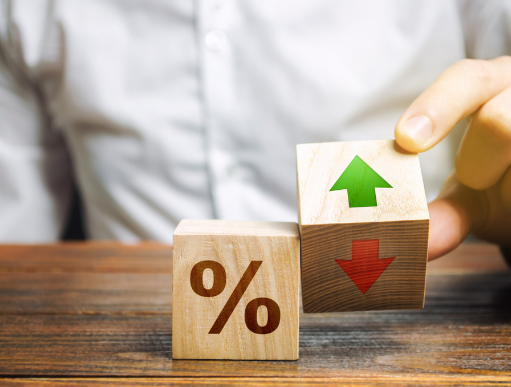 A person using block to show that having poor credit can affect a borrower's interest rates for a loan