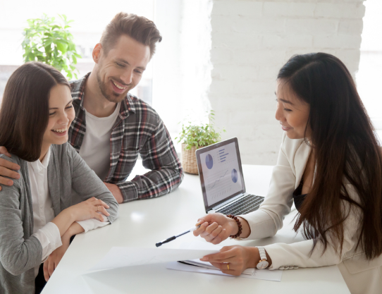 A personal lender describing terms to a couple