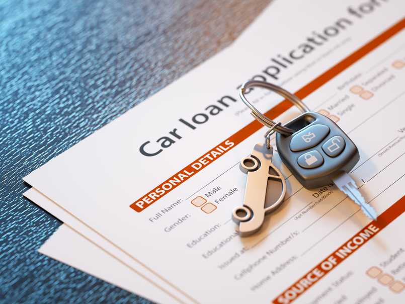 Someone learning how to get a car loan with bad credit