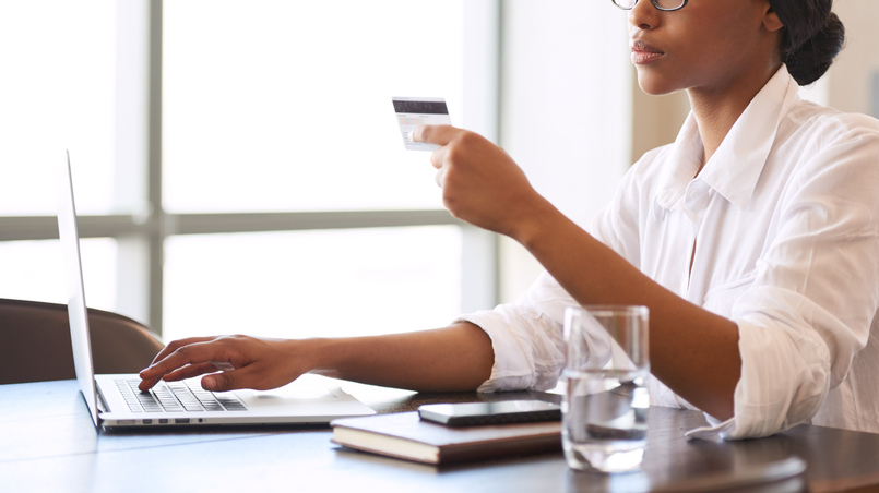 a woman researching how long a wire transfer takes