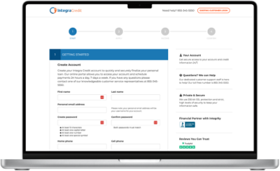 Laptop showing Integracredit Website
