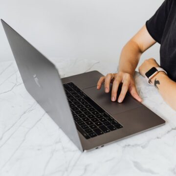 Person looking at loan options on a laptop